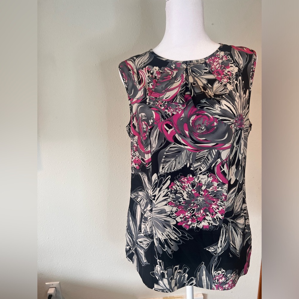 TRINA TURK silk tailored bow front sleeveless blouse.